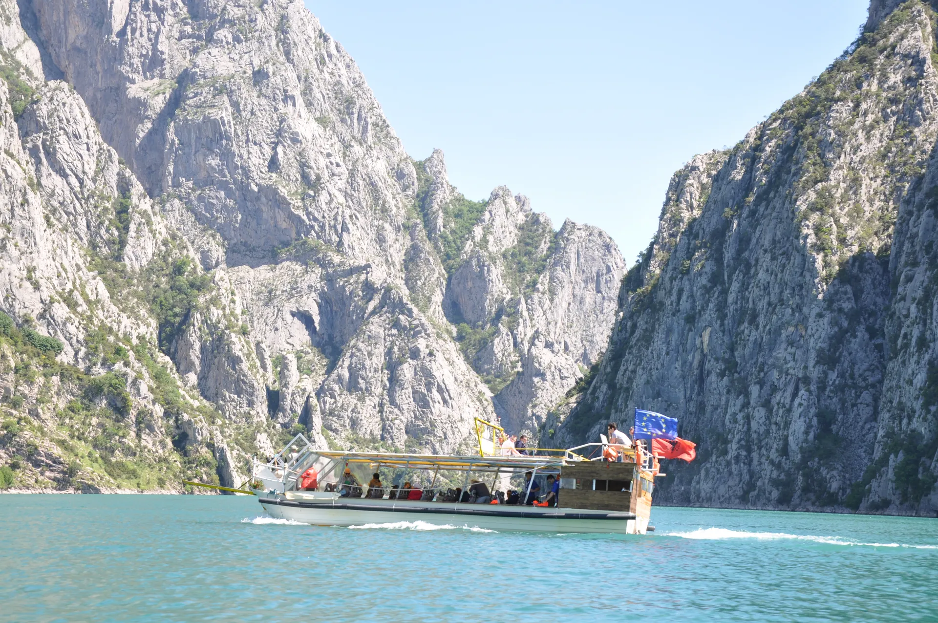 Intricate erosion patterns in the canyon walls revealing centuries of geological history.