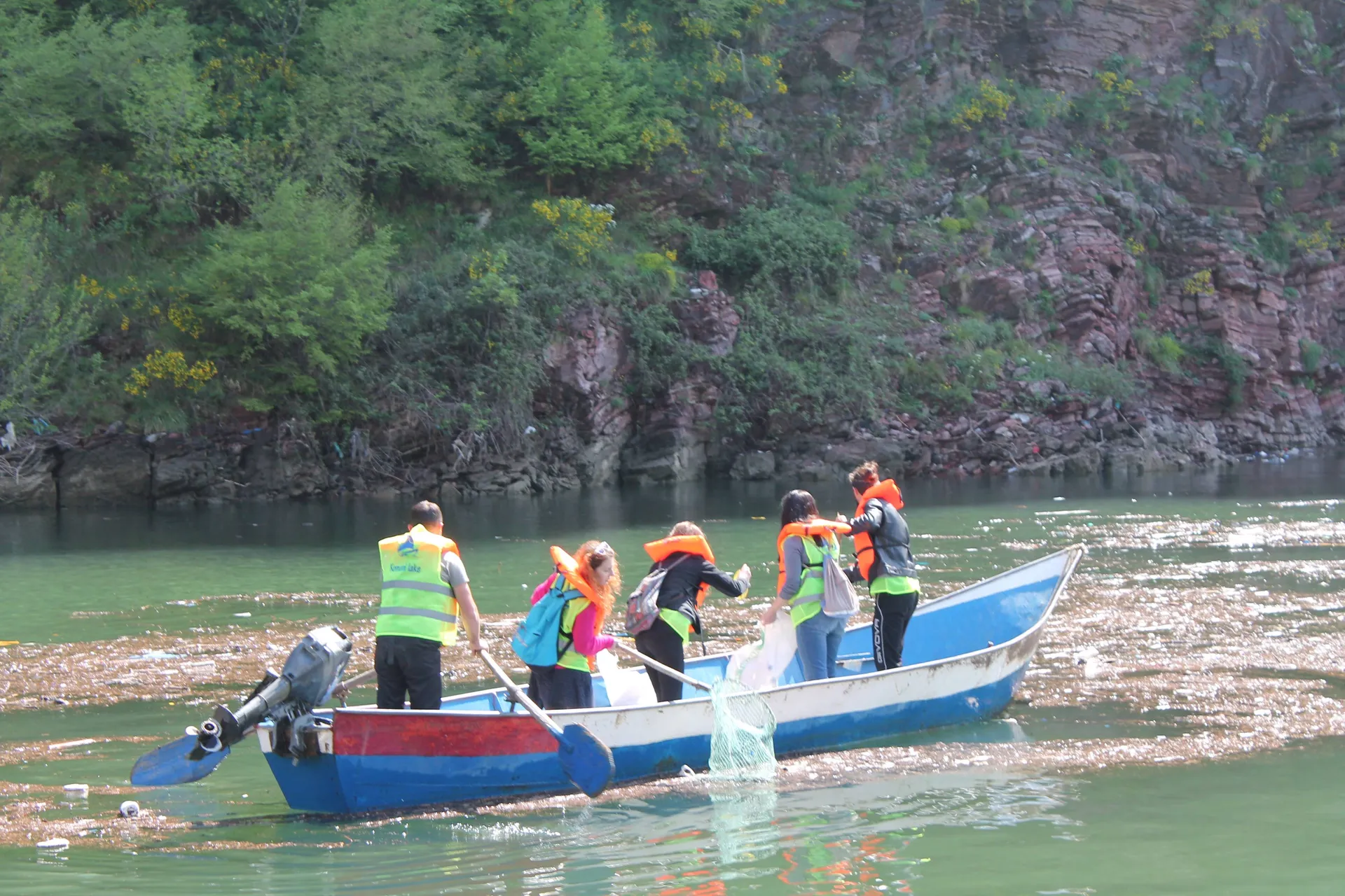 Serene reflections on the mirrored surface of the lake.