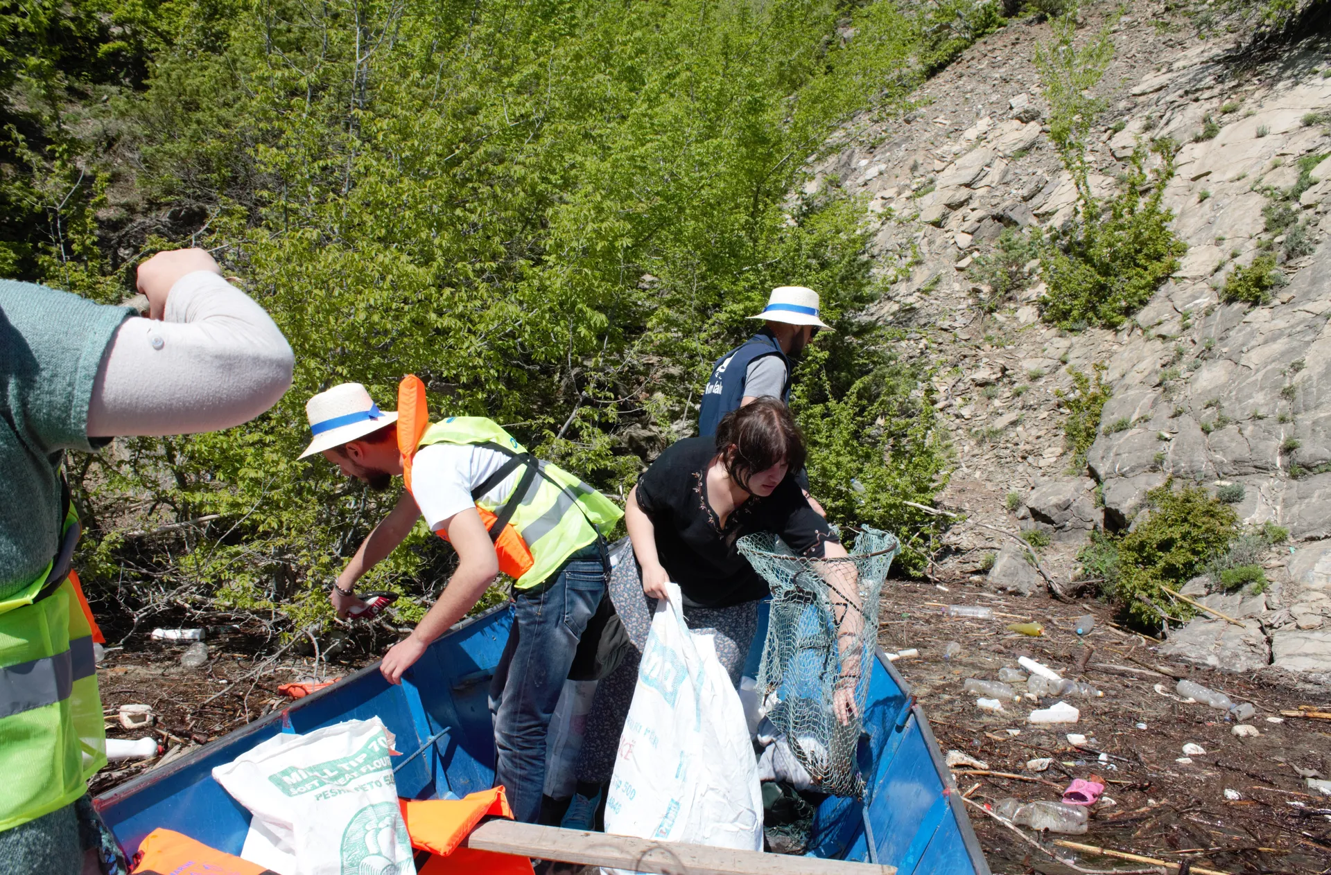 Community volunteers working together to preserve the lake's beauty.
